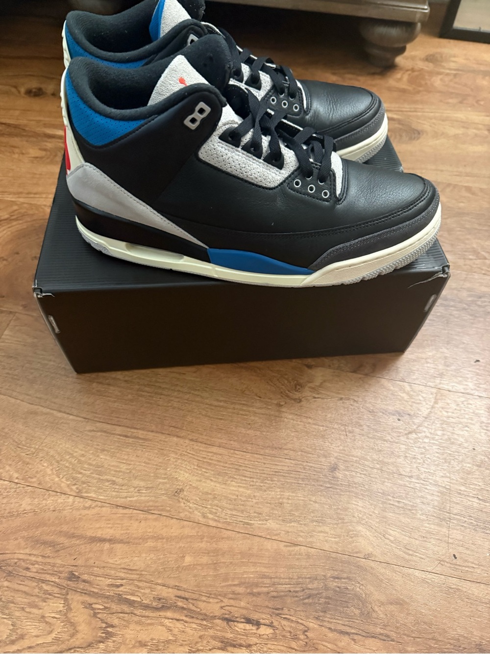 Jordan Men’s Black Sneakers with Blue and White Accents